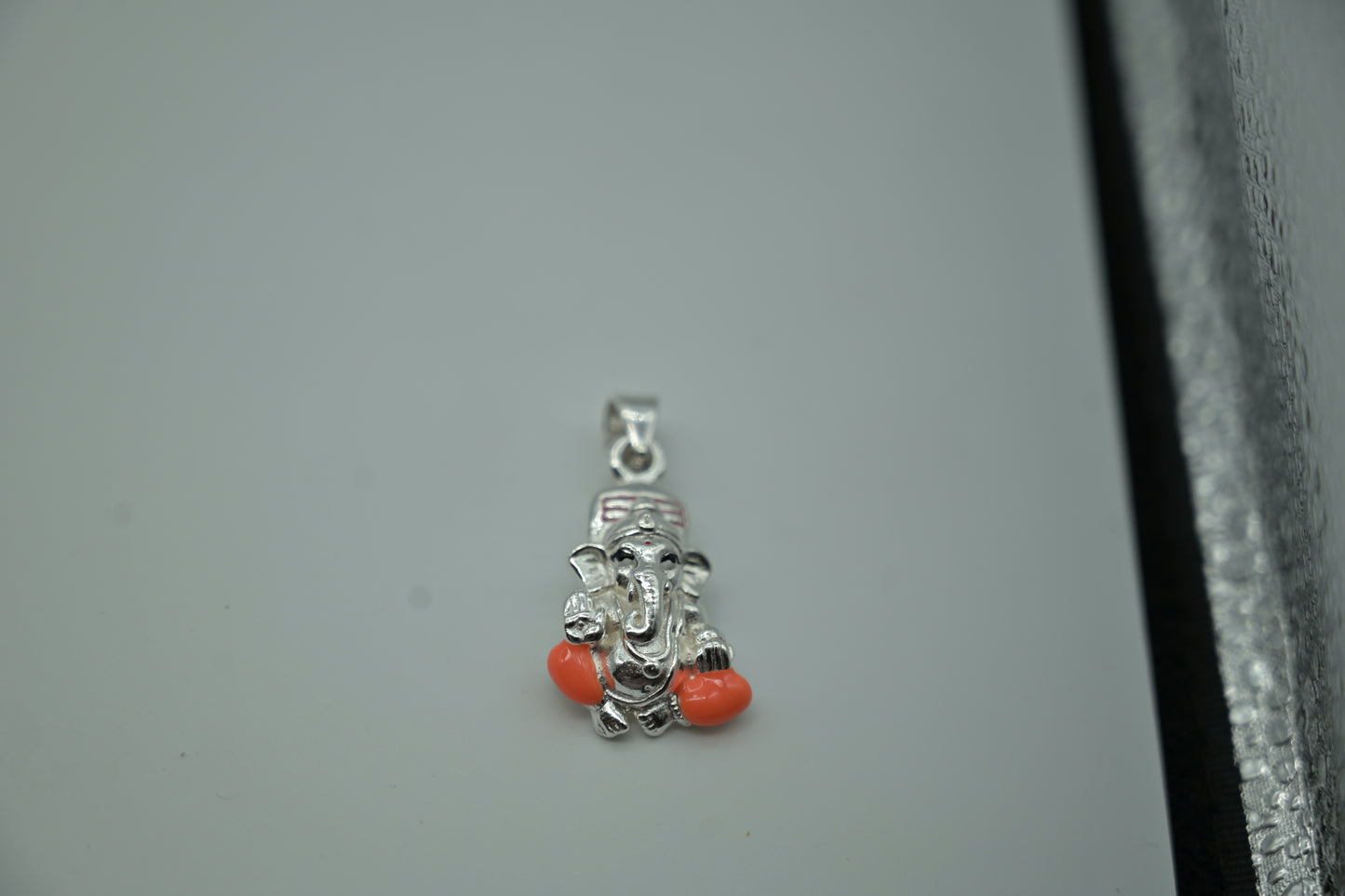 Silver Lord Ganesh Pendant with Orange Accents