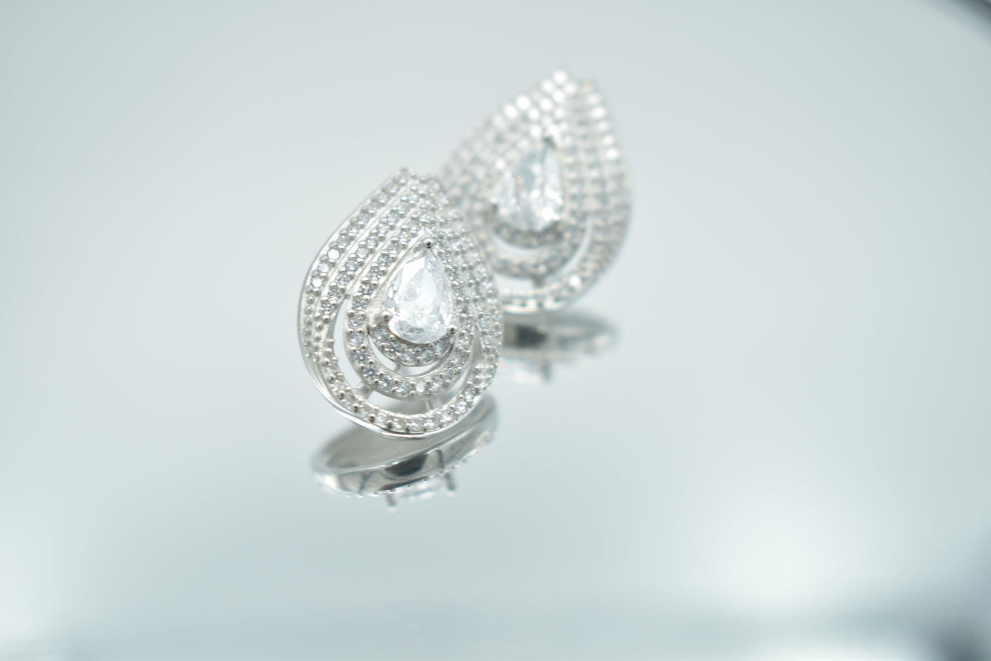 Teardrop Halo Stud Earrings in Sterling Silver with CZ Sparkle