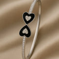 Amor Noir Dual Heart Bangle